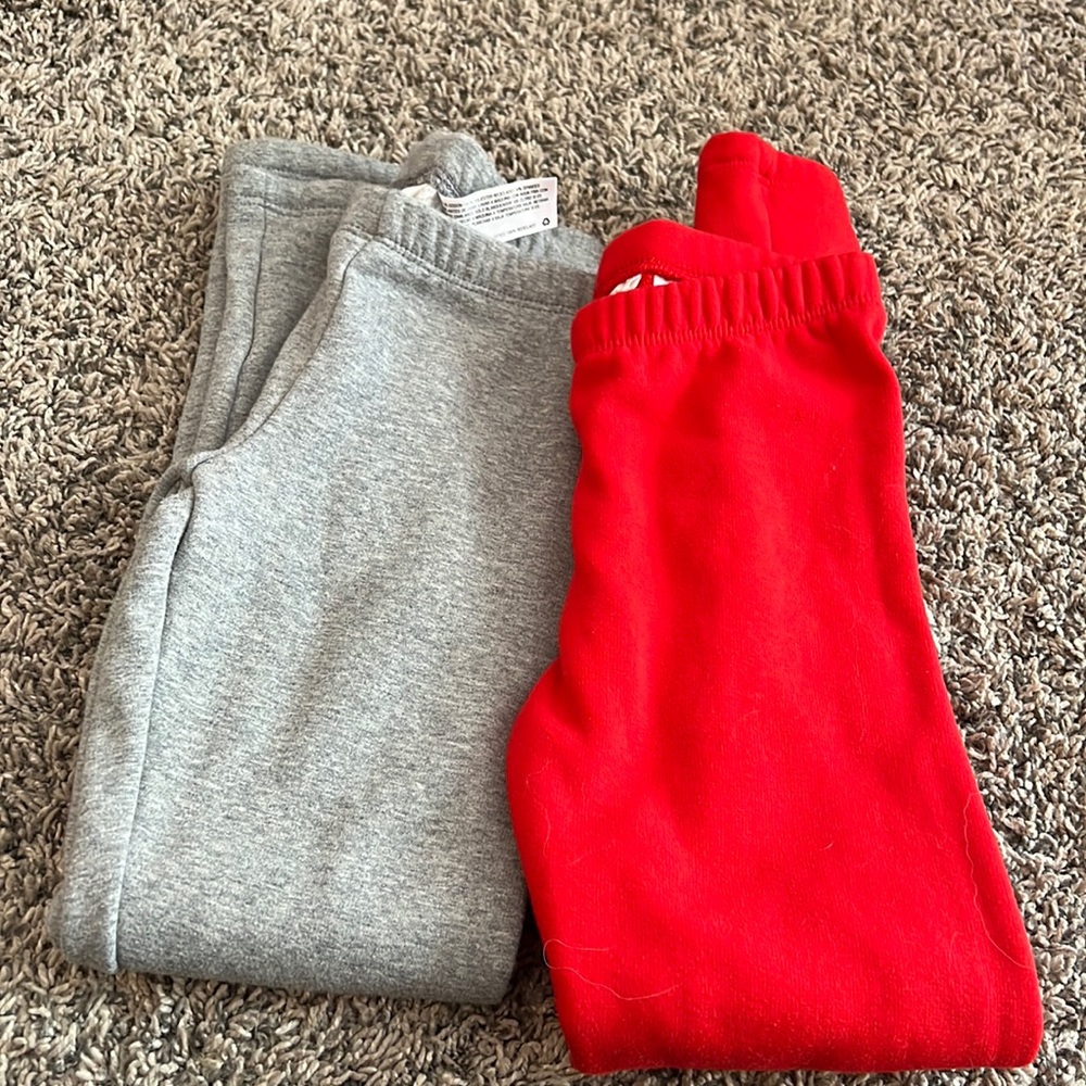 Two pair fleece lined leggings. Cat and Jack size medium (7/8) red and grey